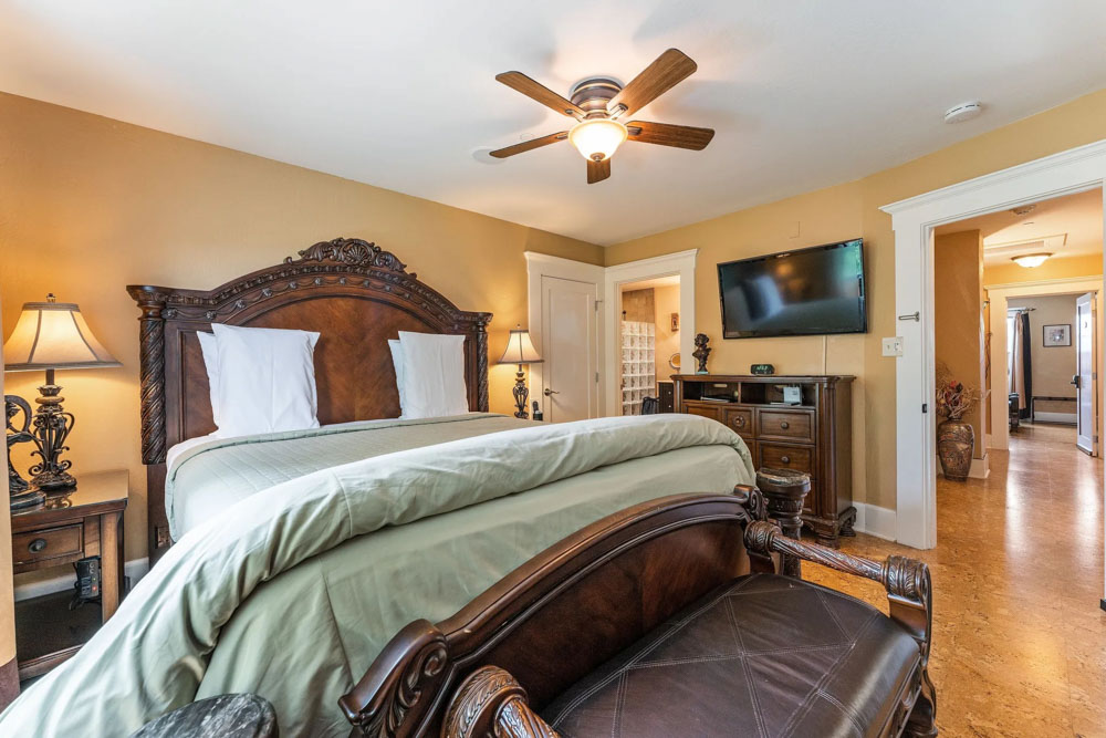 healdsburg bed and breakfast guest rooms with bed, TV, and fan.